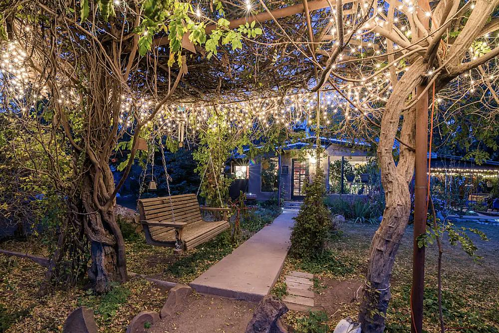 Featured Image - lighted garden with swing