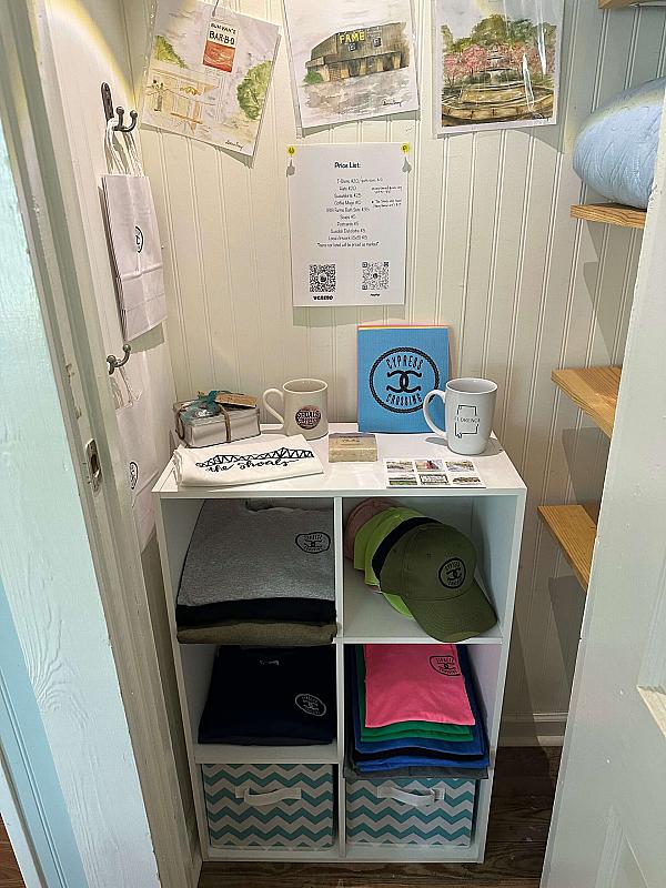 Gift store with mugs and hats