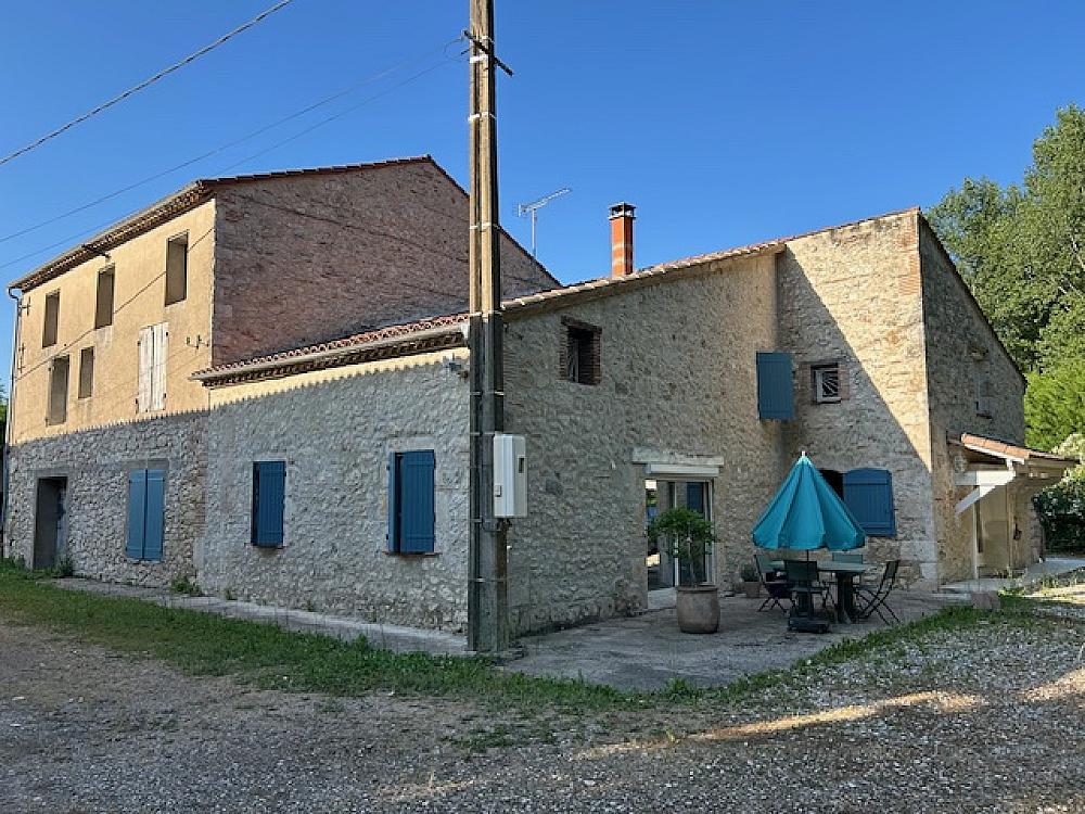 Featured Image - exterior of stone house