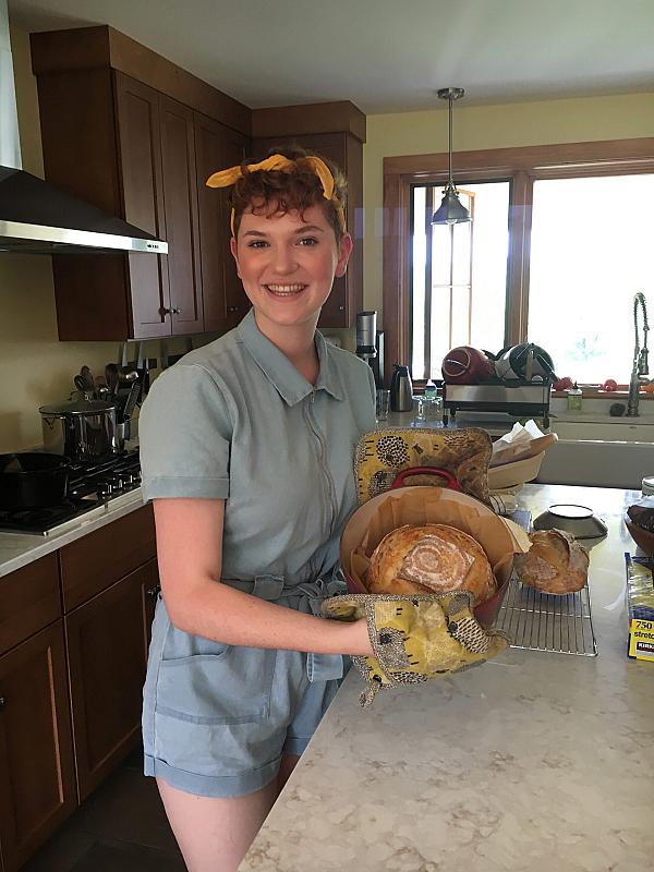 woman in kitchen making bread