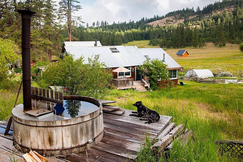Featured Image of Willow Witt Ranch house and land with a hot tub in the foreground