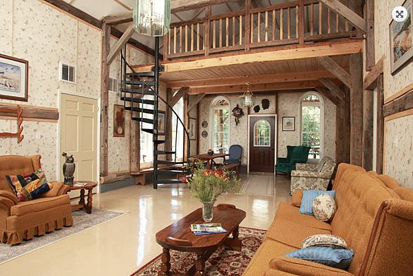 Living room with lofted ceilings in the house