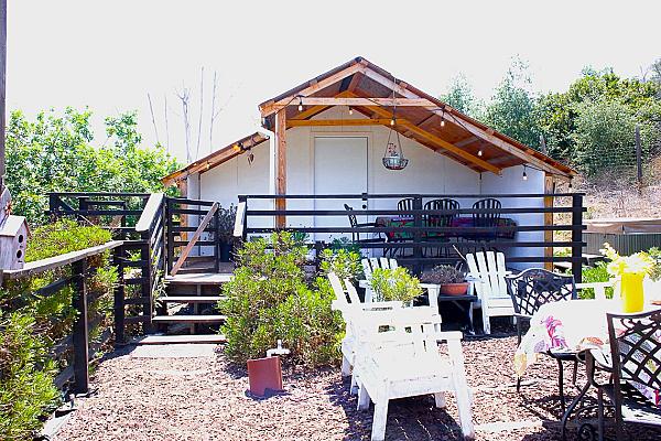 outdoor seating area next to covered living area
