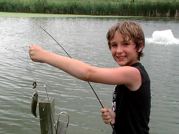 you boy with fishing catch