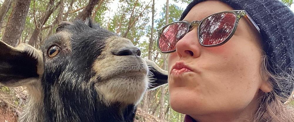 Featured Image - woman and goat kissing