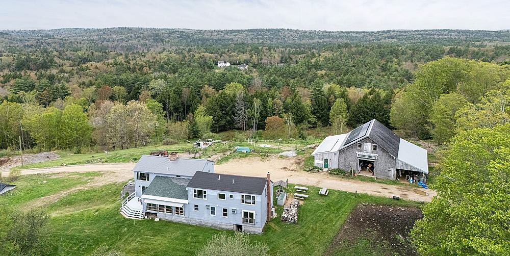Miles Smith Farm is a magical hilltop farmhouse getaway where stressed-out travelers come to trade frustration for fresh air, panoramic pasture views, and the company of Scottish Highland cattle.