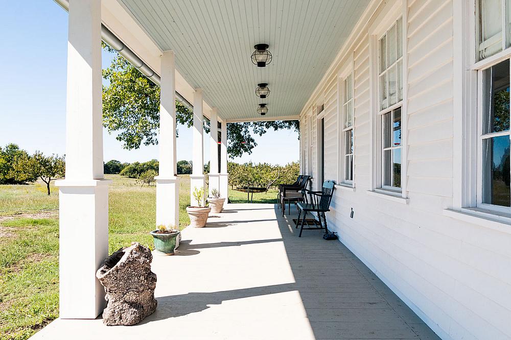 Featured Image- covered porch overlooking the farm