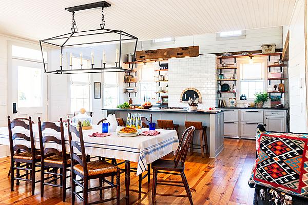 Farm house kitchen with dining table and food