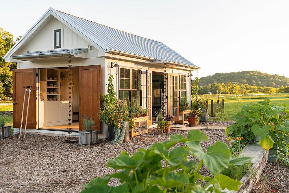Featured Image- Cottage with veggies growing in gardens all around it.