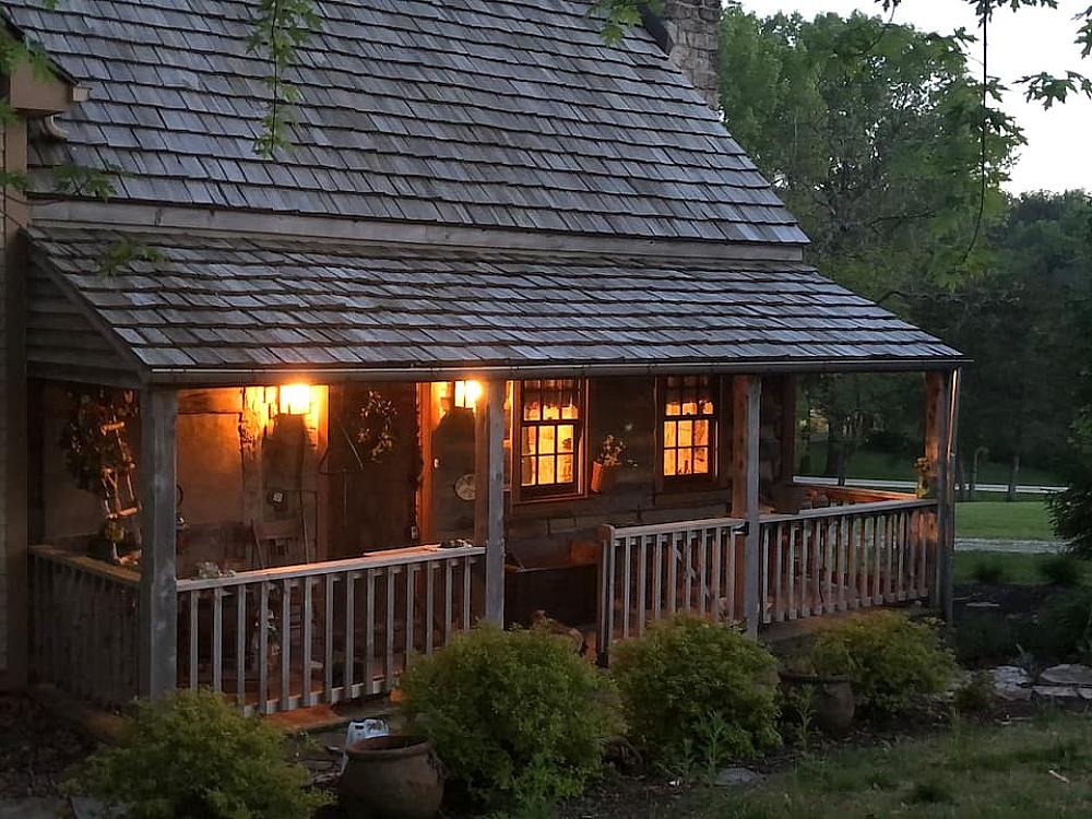 Featured Image - log cabin exterior at nightfall