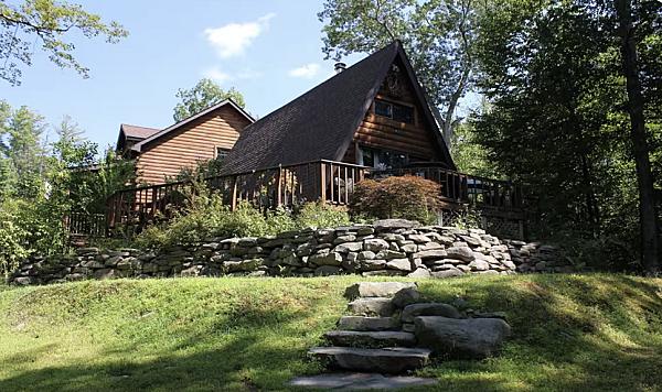 wood A-frame attached to a house