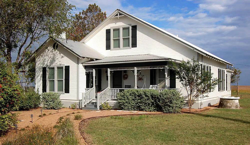 Featured Image- White house with black shutters at the farm