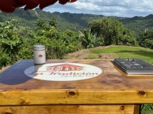 table with coffee and view over rainforest