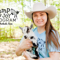 Farm Founder Nicole Zaagman with Samuel one of Parkside Farm's Registered Pygmy Goats with the Jump for JOY Program